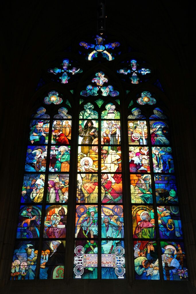 stained glass window st. vitus cathedral, prague castle shpetim ujkani from unsplash