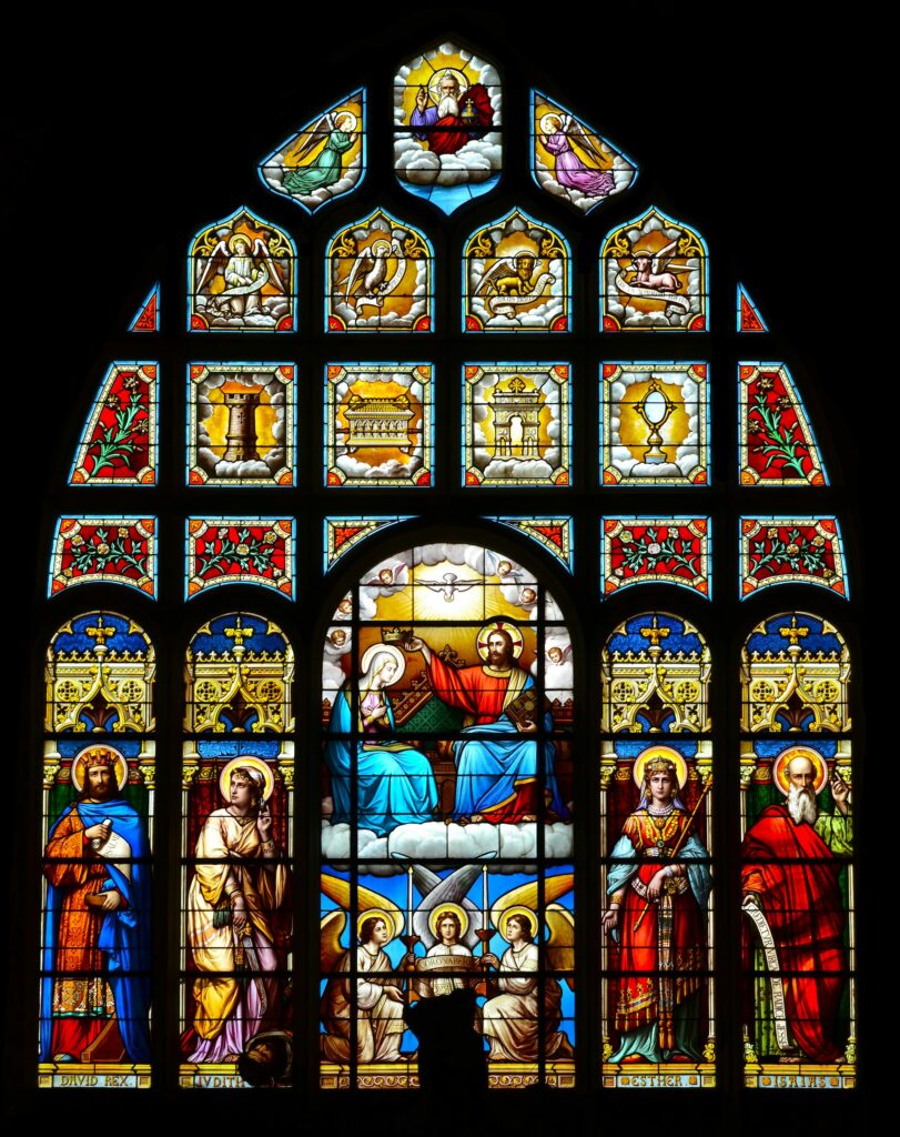 jesus christ and virgin mary stained glass gilles detot from unsplash