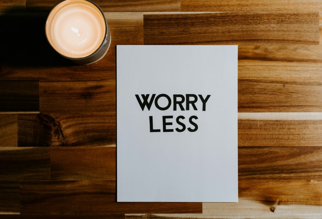 note of worry less on top of a table